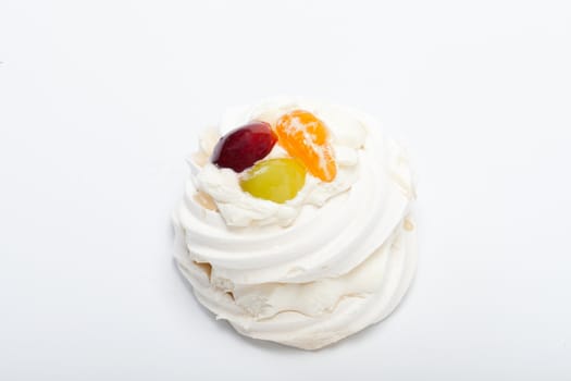 sweet cake with fruits isolated on white