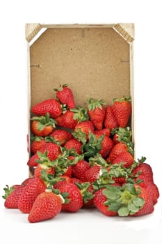 Bpx with strawberries on a white background