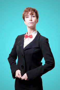 elegant businesswoman with bow tie on blue background