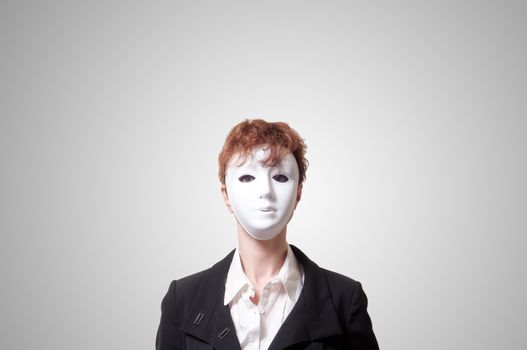 business woman with white mask on gray background