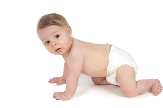 Little cute boy on all fours in studio