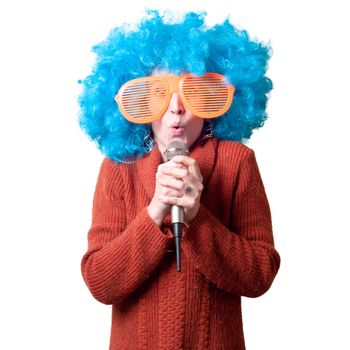 beautiful girl with curly blue wig and turtleneck on white background