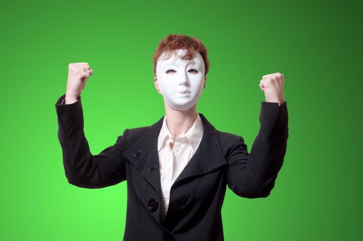 strong business woman with white mask on green background