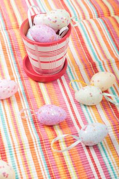 Striped napkin and easter eggs on the napkin