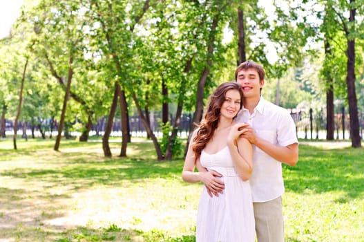 couple hugging in the park, have a good time together