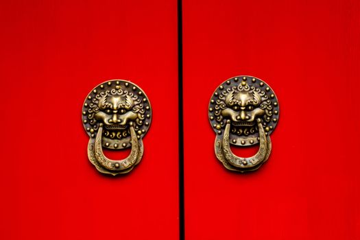 Red Door Ornate Dragon Brass Knockers, one of the symbols of China, Houhai Lake, Beijing