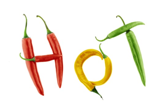 Hot word made from Green, yellow and red hot chili pepper on white background with a clipping path