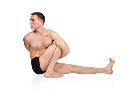 man practicing yoga in position