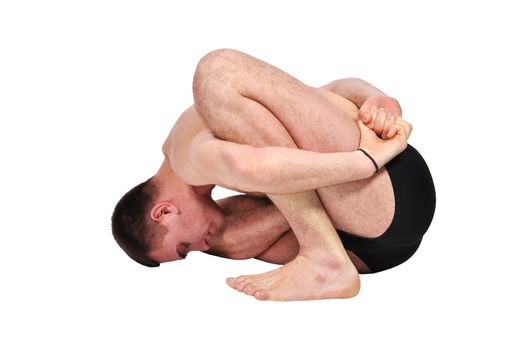 man practicing yoga in position