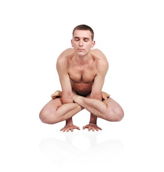 handsome bare chested man doing yoga