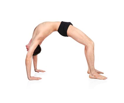 handsome bare chested man doing yoga