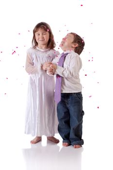 Cute little boy and girl wishing to get married