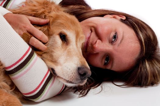 Cute young woman with her purebred Golden Retriever