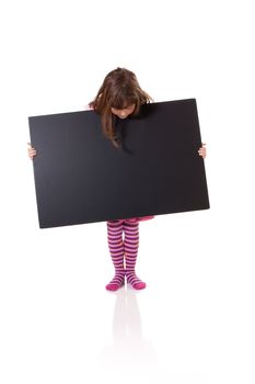 Cute little girl holding a blank cardboard sign