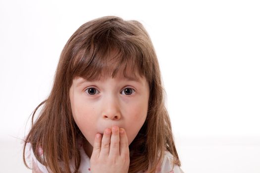 Little girl with a surprised expression