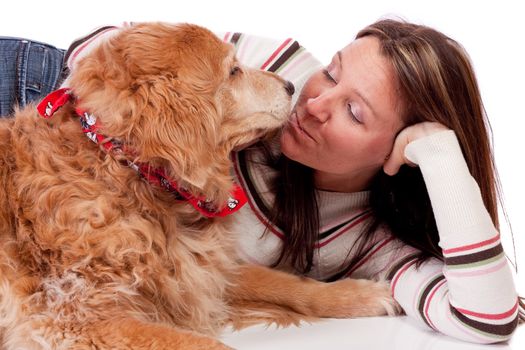 Cute young woman with her purebred Golden Retriever