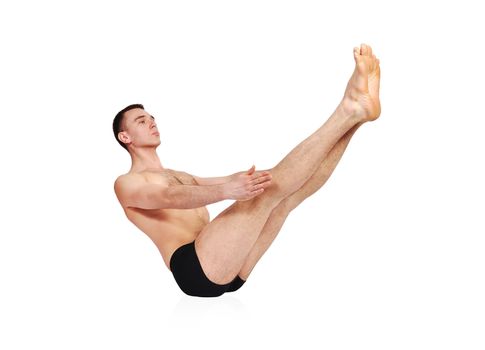 handsome bare-chested man doing yoga