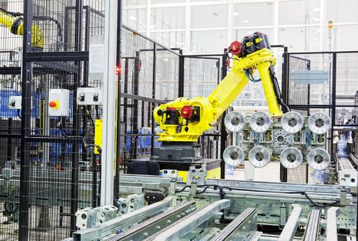 Machine for packing of plastic bottles close up