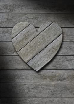 Gray weathered wooden heart on wood background