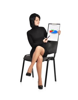 woman sitting on chair with pie chart on clipboard