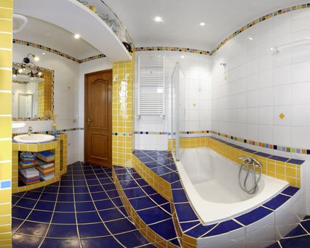 Yellow and blue modern bathroom