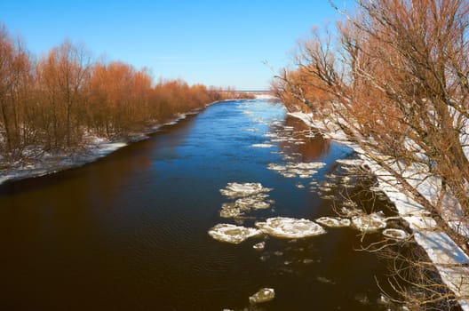 Winter river.Chunks of ice floating on the river in winter