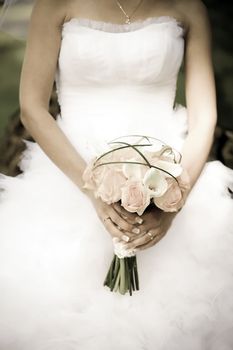 Bride holding a wedding bouquet