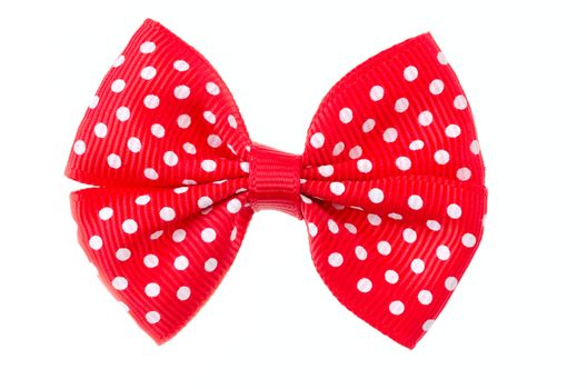 Red ribbon bow isolated on white background.