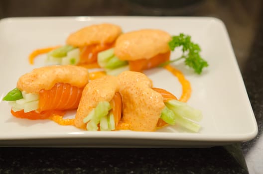 Roll made of salmon is japanese cuisine