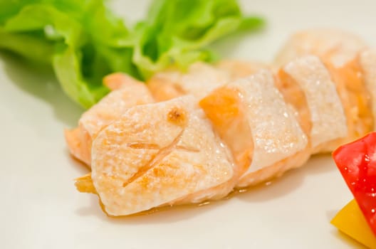 Grilled salmon belly served with fresh vegetable