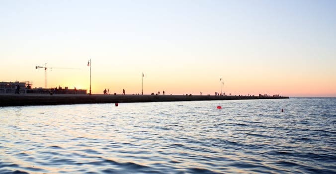 View of molo Audace at sunset, Trieste - Italy
