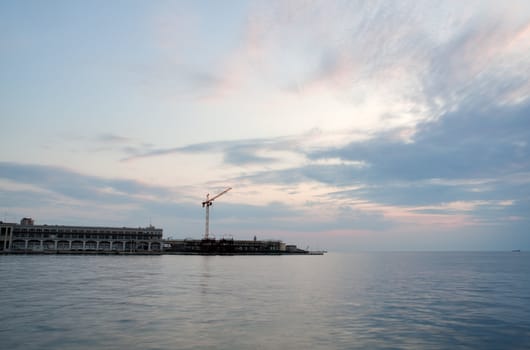 View of Trieste harbor at sunset, Italy