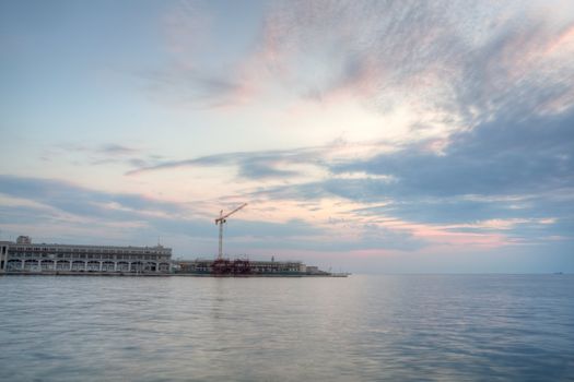 View of Trieste harbor at sunset, Italy