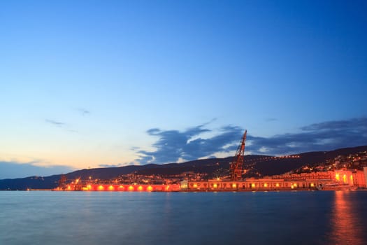 View of Trieste harbor at sunset, Italy