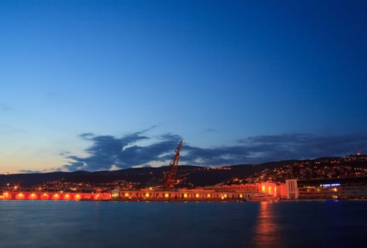 View of Trieste harbor at sunset, Italy