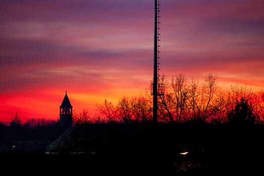 View of a bell tower, red sunset
