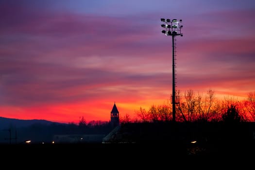View of a bell tower, red sunset