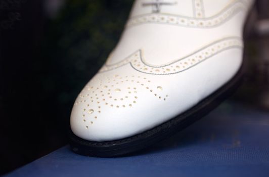 Photo of Elegant male white shoe