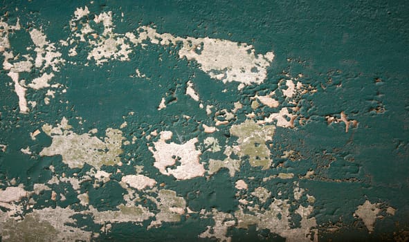 Photo of Cracked green wall