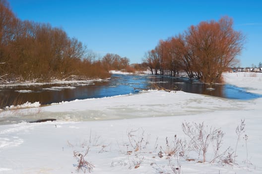 Winter river.Chunks of ice floating on the river in winter