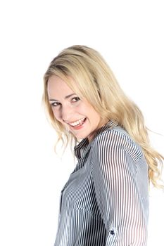Beautiful laughing carefree blonde woman standing sideways looking at the camera isolated on white Beautiful laughing carefree blonde woman standing sideways looking at the camera isolated on white