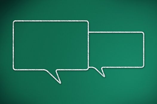 Two speech bubbles on a green chalkboard