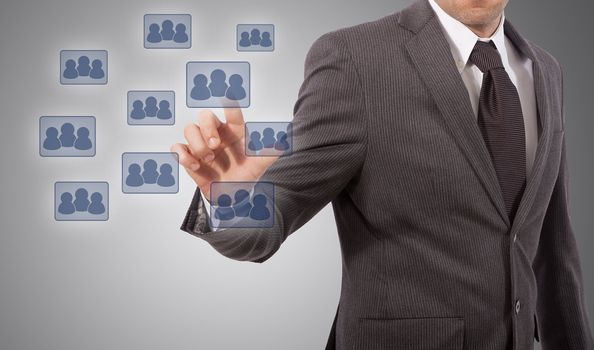 business man touching social network structure icon, grey background