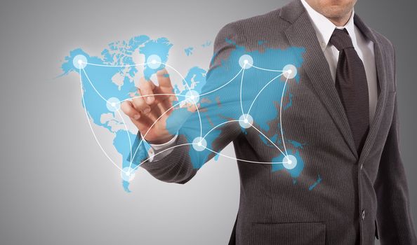 business man touching world map with social network structure, grey background