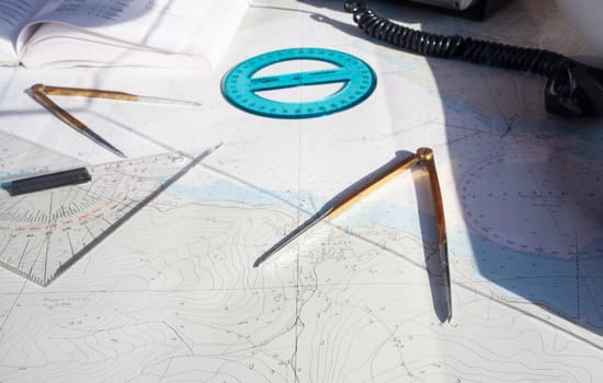 compass, goniometer and other tool. Route on a Maritime Chart