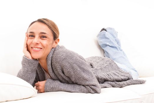 woman smiling on sofa