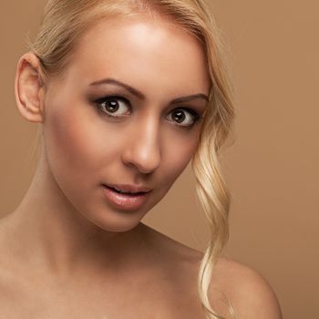Portrait of natural young woman with blonde hair