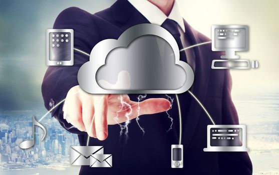 Business man with cloud computing theme with big city backdrop