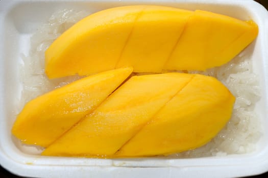 Native Thai style of dessert, Mango with sticky rick in foam package