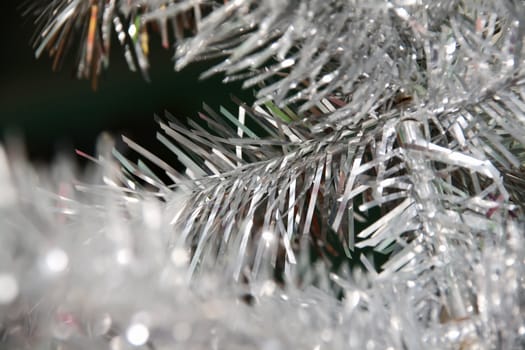 silver tinsel on a black background